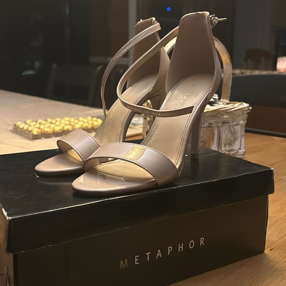 Tan high heel shoes